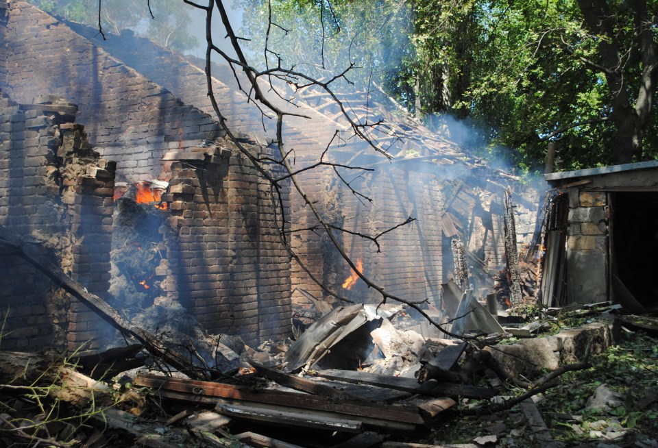 Smoldering remains of a brick building after a drone strike in Odesa, Ukraine.